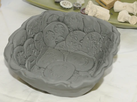 clay bowl before kiln firing